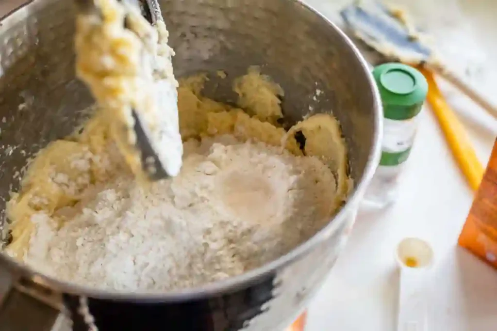 Irresistibly Soft Snickerdoodle Cookies with Cinnamon Sugar Magic 9 Mixing bowl with flour added to cookie batter